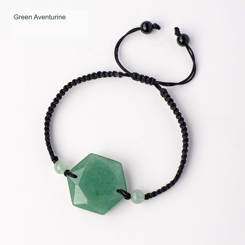 Original faceted geometric stone cord bracelet with English supplier material label; physical bead and cord unchanged