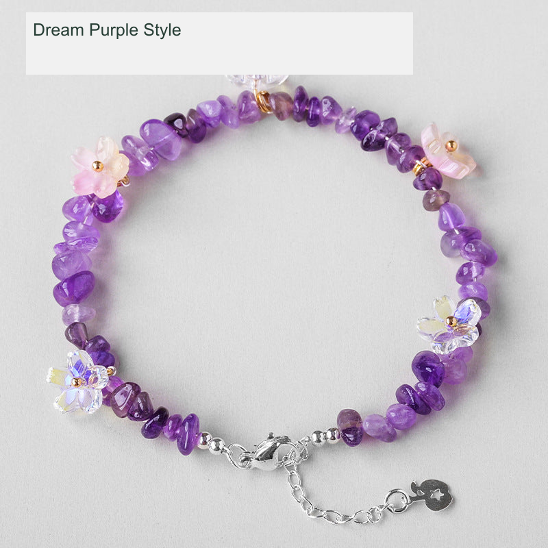 Original crystal-chip bracelet with decorative flower accents; physical product photograph preserved