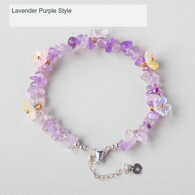 Original crystal-chip bracelet with decorative flower accents; physical product photograph preserved