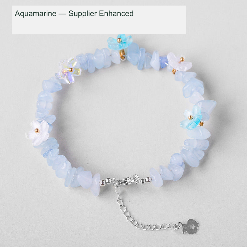 Original crystal-chip bracelet with decorative flower accents; physical product photograph preserved