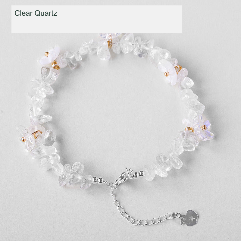 Original crystal-chip bracelet with decorative flower accents; physical product photograph preserved