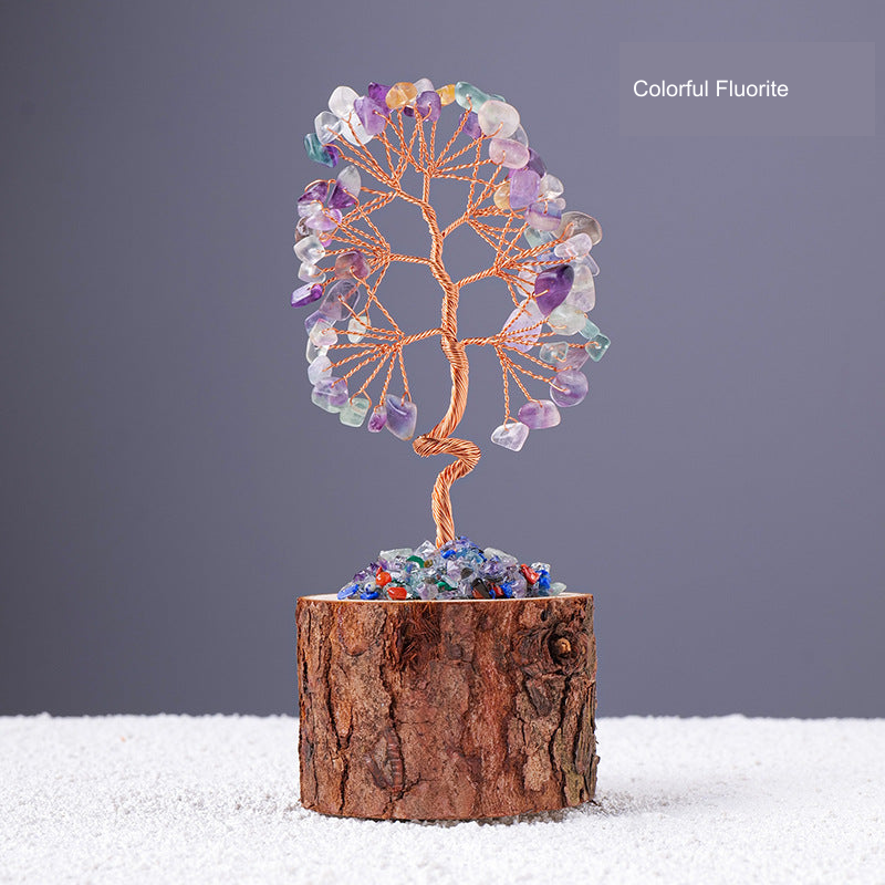 Stone-chip wire tree on bark-textured stump base; original product photograph with English material label.