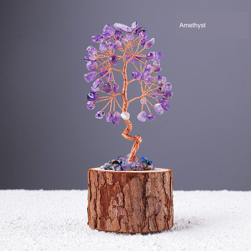 Stone-chip wire tree on bark-textured stump base; original product photograph with English material label.
