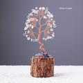 Stone-chip wire tree on bark-textured stump base; original product photograph with English material label.