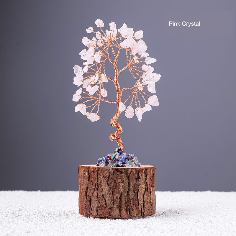 Stone-chip wire tree on bark-textured stump base; original product photograph with English material label.