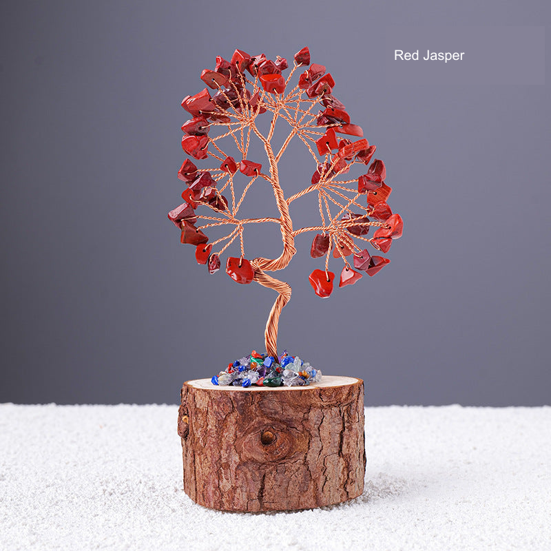 Stone-chip wire tree on bark-textured stump base; original product photograph with English material label.