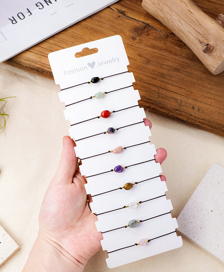 Actual ten-bracelet set supplier photograph with only outside marketing copy/logo removed; bead design unchanged